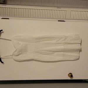 White, mid length, form fitting dress